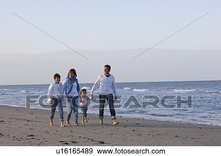 Family on the beach. View Large Photo Image Stock Photo - Family on the beach.. Fotosearch