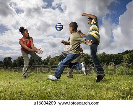 family playing football View Large Photo Image Stock Photo - family playing football. Fotosearch