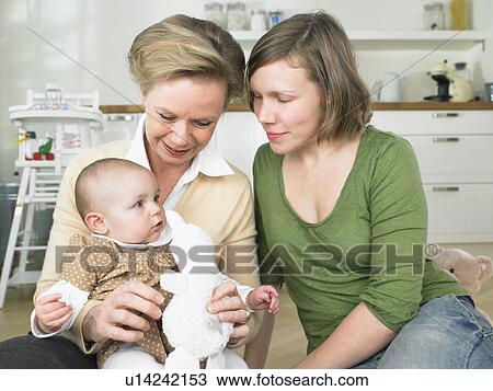 Stock Image - family playing together. Fotosearch