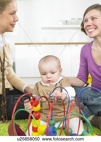 family playing together View Large Photo Image Stock Image - family playing together. Fotosearch