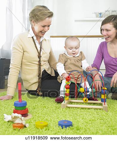 family playing together View Large Photo Image Stock Photo - family playing together. Fotosearch
