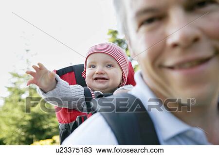 father and baby in backpack hiking View Large Photo Image Stock Image - father and baby in backpack hiking. Fotosearch