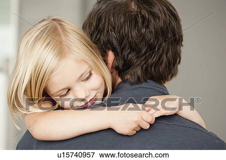 Stock Photo - father and daughter hugging. Fotosearch