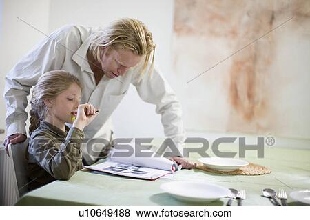 father and daughter in kitchen View Large Photo Image Stock Photo - father and daughter in kitchen. Fotosearch