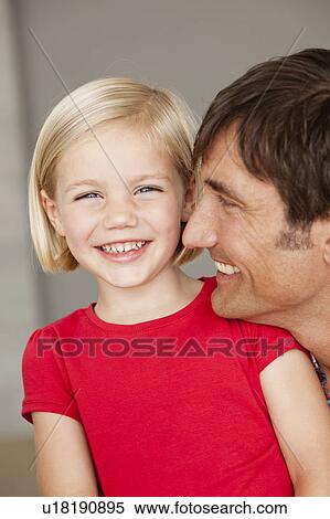Stock Photography - father and daughter smiling. Fotosearch