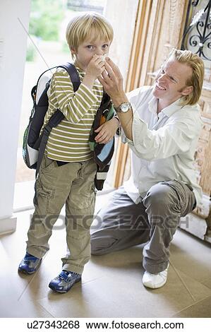 father getting his son ready for school View Large Photo Image Stock Photo - father getting his son ready for school. Fotosearch