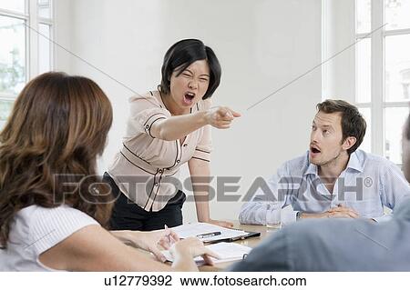 Female shouting in a meeting View Large Photo Image Stock Image - Female shouting in a meeting. Fotosearch