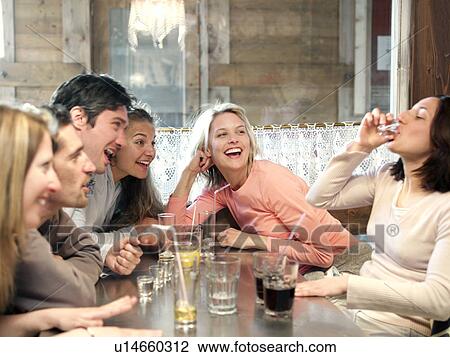 friends drinking in ski lodge bar View Large Photo Image Stock Image - friends drinking in ski lodge bar. Fotosearch