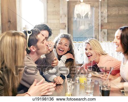 friends drinking in ski lodge bar View Large Photo Image Stock Photograph - friends drinking in ski lodge bar. Fotosearch