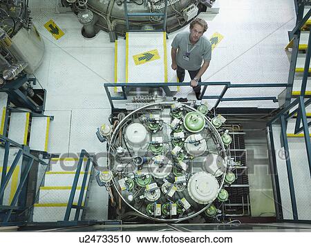 Fusion Reactor Scientist At Work View Large Photo Image Stock Image - Fusion Reactor Scientist At Work. Fotosearch