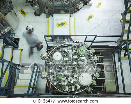 Stock Photo - Fusion Reactor Scientist At Work. Fotosearch