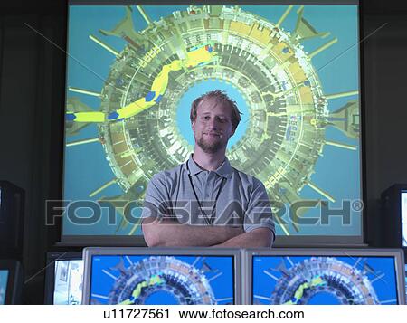 Fusion Reactor Scientist With Screens View Large Photo Image Stock Image - Fusion Reactor Scientist With Screens. Fotosearch