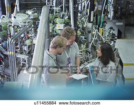 Fusion Reactor Scientists At Work View Large Photo Image Picture - Fusion Reactor Scientists At Work. Fotosearch
