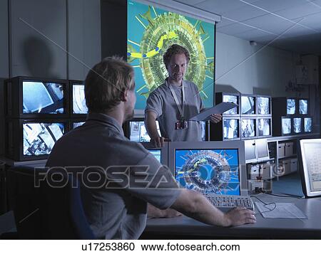 Fusion Reactor Scientists At Work View Large Photo Image Stock Image - Fusion Reactor Scientists At Work. Fotosearch