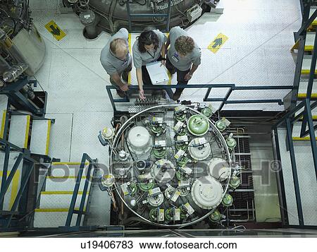 Fusion Reactor Scientists At Work View Large Photo Image Stock Image - Fusion Reactor Scientists At Work. Fotosearch