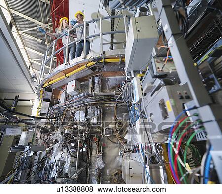 Stock Photo - Fusion Reactor Scientists at Work. Fotosearch