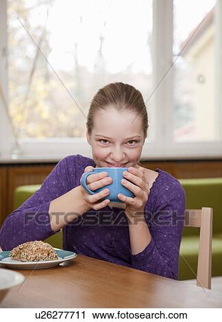 girl drinking from large cup View Large Photo Image Stock Image - girl drinking from large cup. Fotosearch