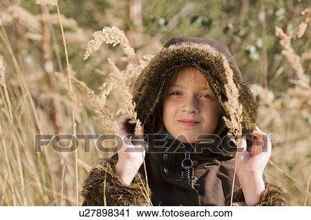 girl in field View Large Photo Image Stock Image - girl in field. Fotosearch