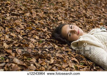 Picture - girl listening to music. Fotosearch