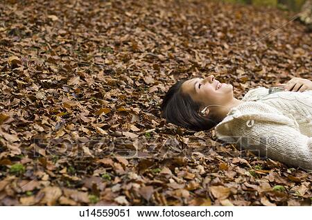 Stock Image - girl listening to music. Fotosearch