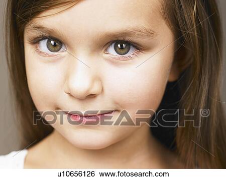Stock Photograph - Girl looking at camera. Fotosearch