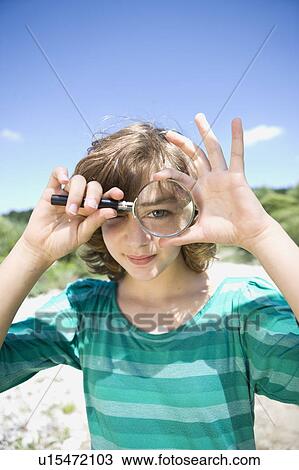 girl looking through a loupe View Large Photo Image Stock Image - girl looking through a loupe. Fotosearch