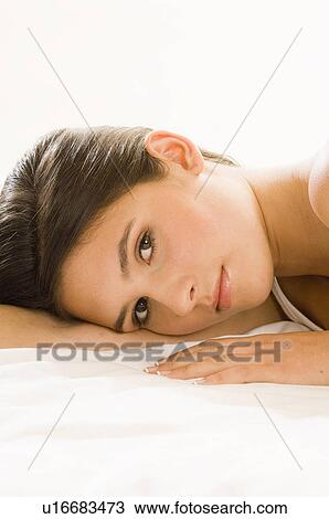 Stock Image - girl looking to camera. Fotosearch