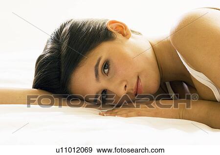 Stock Photo - girl looking to camera. Fotosearch