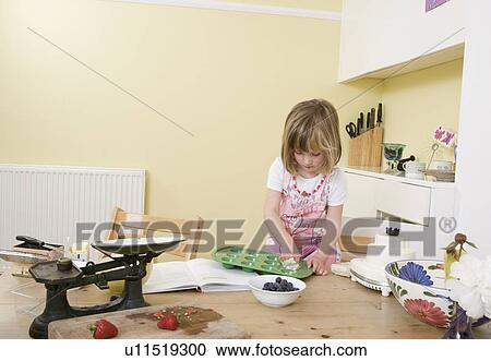 girl making cakes View Large Photo Image Stock Image - girl making cakes. Fotosearch