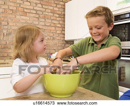 girl mixing ingredients in bowl View Large Photo Image Stock Image - girl mixing ingredients in bowl. Fotosearch