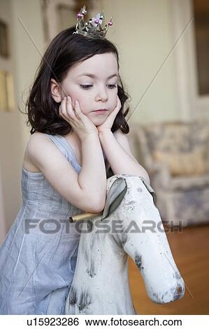 girl resting her head on her hands View Large Photo Image Stock Photograph - girl resting her head on her hands. Fotosearch