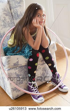 girl sitting in chair View Large Photo Image Stock Image - girl sitting in chair. Fotosearch
