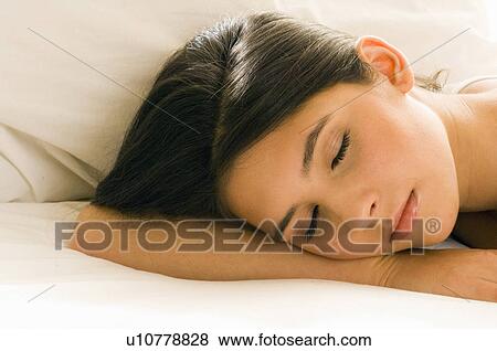 Stock Photo - girl sleeping. Fotosearch
