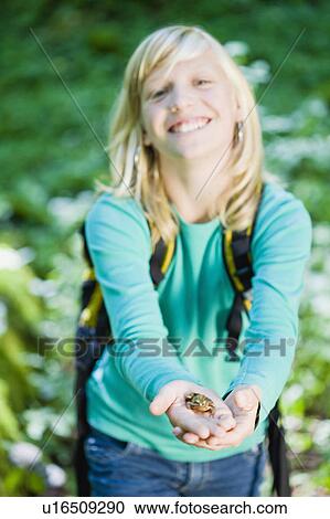 girl with a little frog View Large Photo Image Stock Image - girl with a little frog. Fotosearch