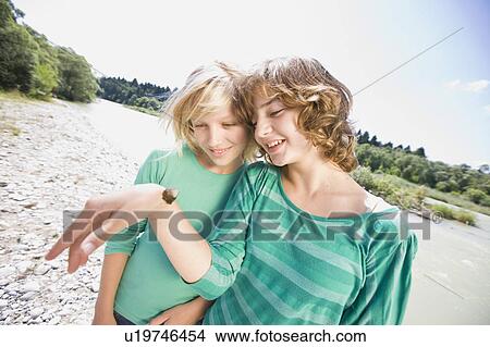 girls and butterfly View Large Photo Image Picture - girls and butterfly. Fotosearch