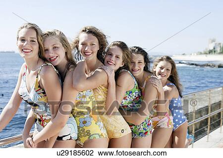 Stock Image - girls wearing retro swimming costumes. Fotosearch