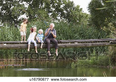 grandfather and children fishing View Large Photo Image Stock Photo - grandfather and children fishing. Fotosearch