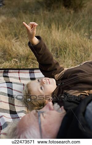 grandfather and granddaughter at picnic View Large Photo Image Stock Image - grandfather and granddaughter at picnic. Fotosearch
