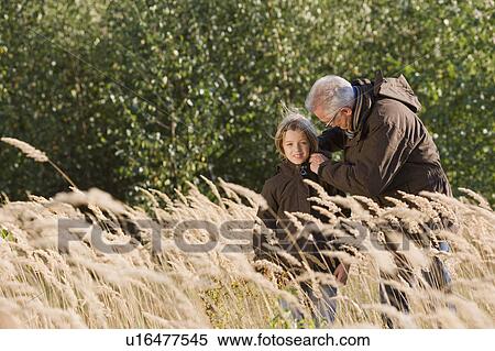 Stock Photography - grandfather and granddaughter. Fotosearch