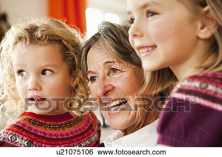 grandma and grandchildren smiling View Large Photo Image Stock Photograph - grandma and grandchildren smiling. Fotosearch