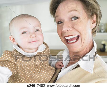 Grandmother and baby View Large Photo Image Stock Image - Grandmother and baby. Fotosearch