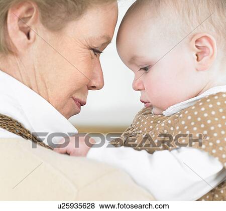 Stock Photo - grandmother and baby. Fotosearch