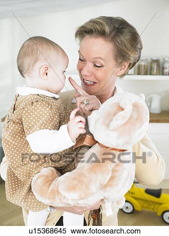 Grandmother and baby View Large Photo Image Stock Photography - Grandmother and baby. Fotosearch