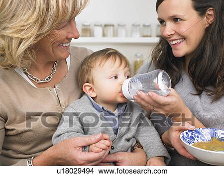 Picture - grandmother, mother and baby boy. Fotosearch
