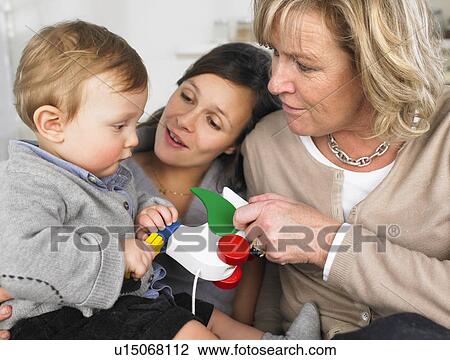 grandmother, mother and baby boy View Large Photo Image Stock Image - grandmother, mother and baby boy. Fotosearch