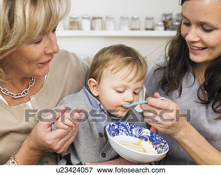 grandmother, mother and baby boy View Large Photo Image Stock Photo - grandmother, mother and baby boy. Fotosearch