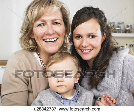 Stock Photo - grandmother, mother and baby boy. Fotosearch
