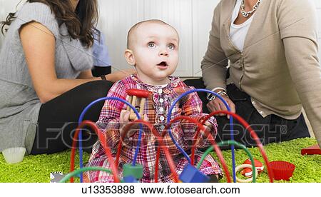 Stock Photo - grandmother, mother and baby. Fotosearch