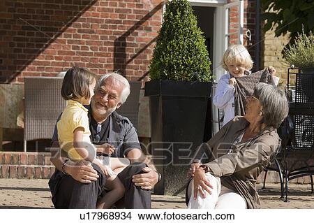 grandparents with grandchildren View Large Photo Image Picture - grandparents with grandchildren. Fotosearch