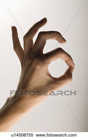 Hand gesture indicating excellence View Large Photo Image Stock Photography - Hand gesture indicating excellence. Fotosearch